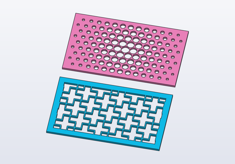 A grille of plus signs and a plate with graded holes