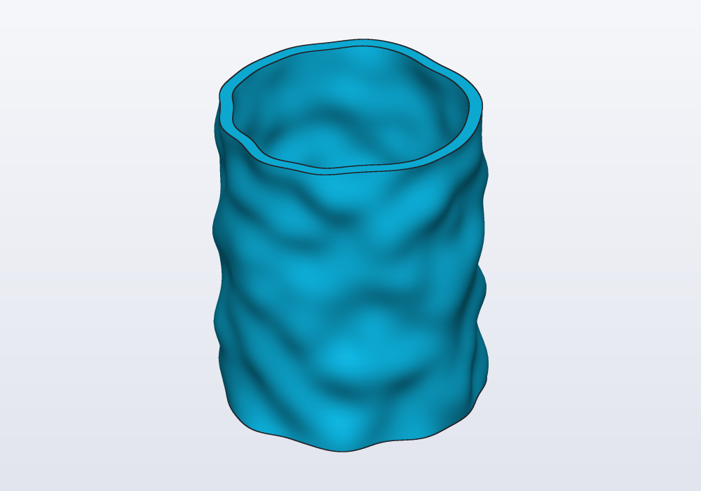 A pen pot with a bumpy skin