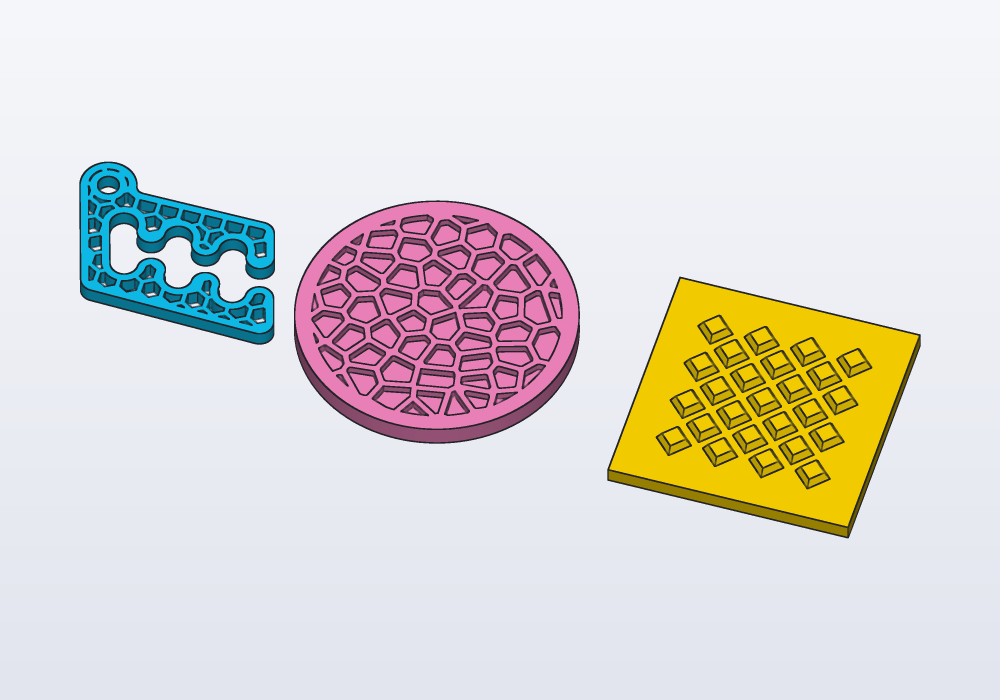 A honeycomb Carlo, a coaster with Voronoi pockets and a tile with studs