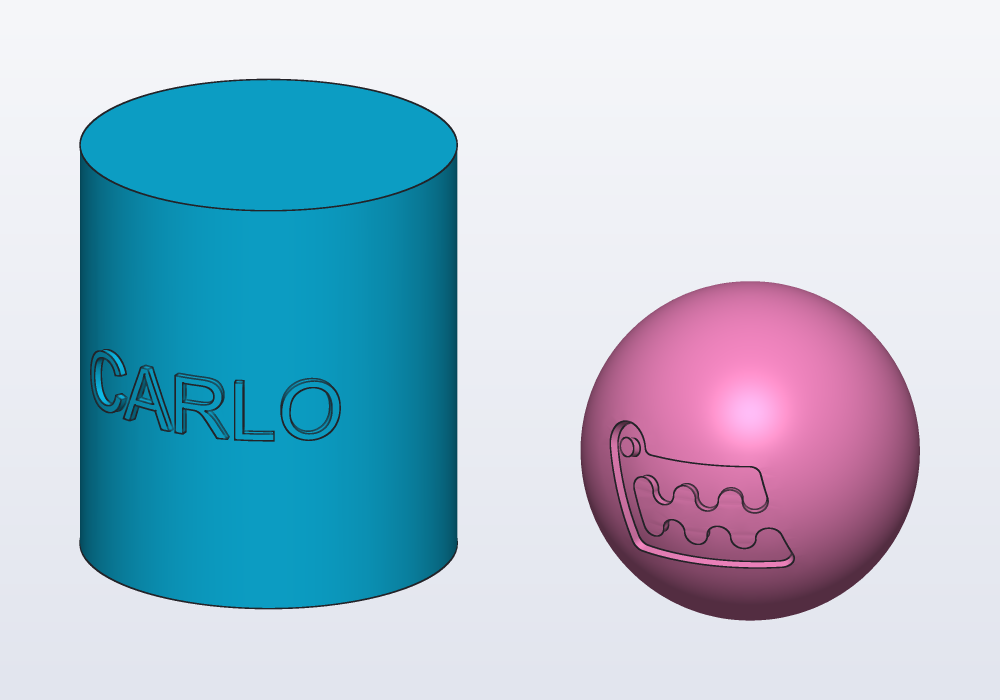 A name round a mug and Carlo stamped on a ball