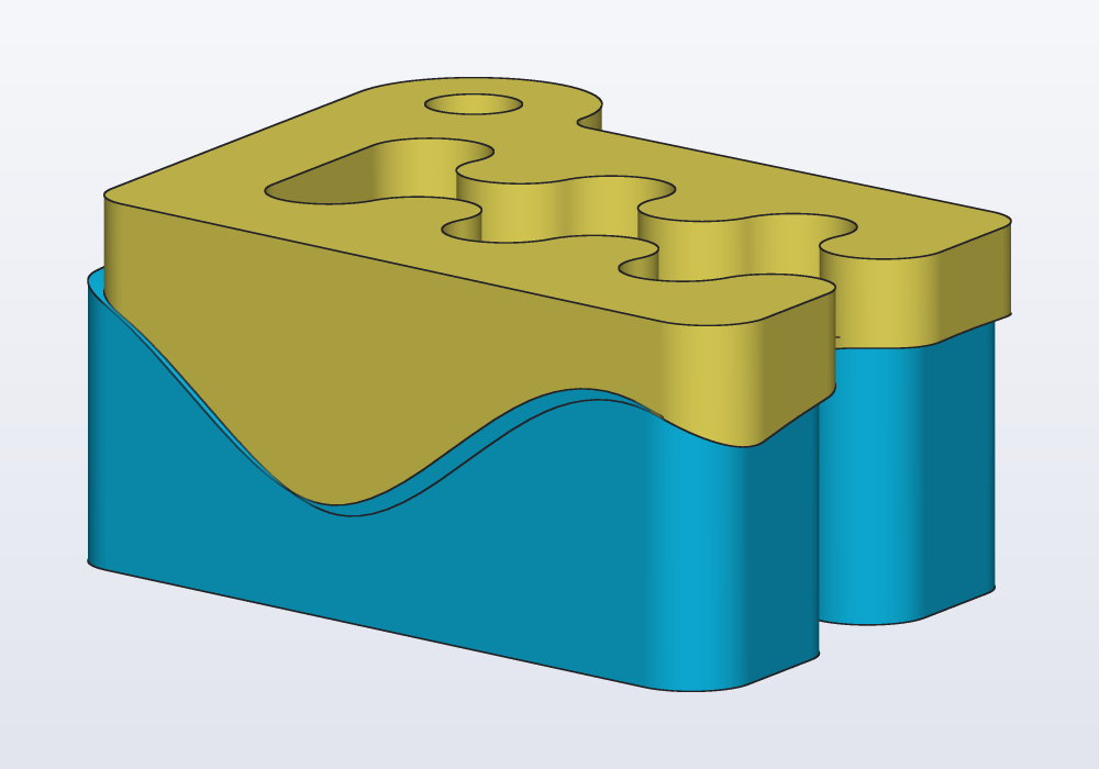 Carlo split by a wavy surface into a top and a bottom, pushed apart